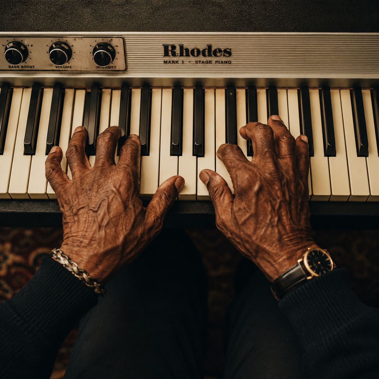Leon Bishop's hands playing a Rhodes keyboard