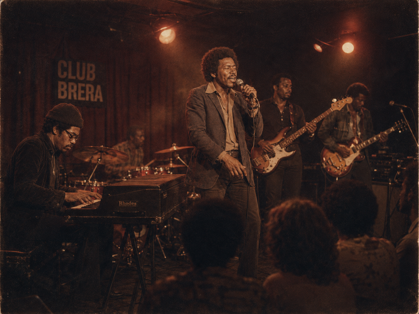 Goldie Cameron and his band performing on stage at Club Brera